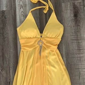 Yellow form fitting yellow dress